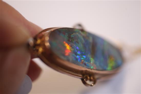 An Edwardian 9ct gold and black opal brooch, 51mm.